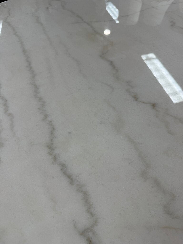Round White Marble Dining Table with 4 Gray Upholstered Chairs