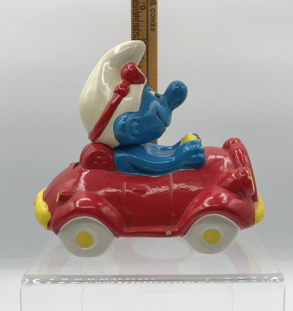 Vintage 1983 Smurf in Car Coin Bank /b