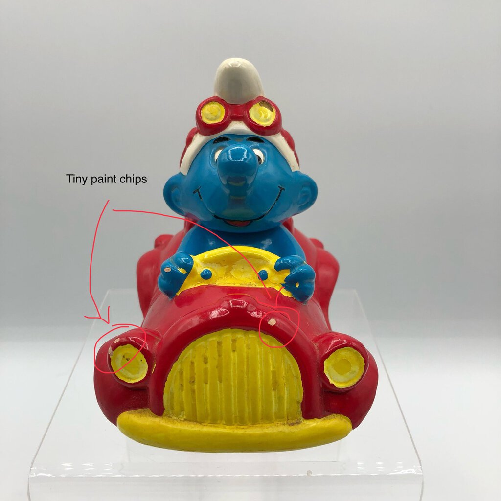 Vintage 1983 Smurf in Car Coin Bank /b