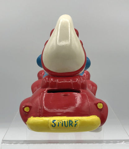 Vintage 1983 Smurf in Car Coin Bank /b