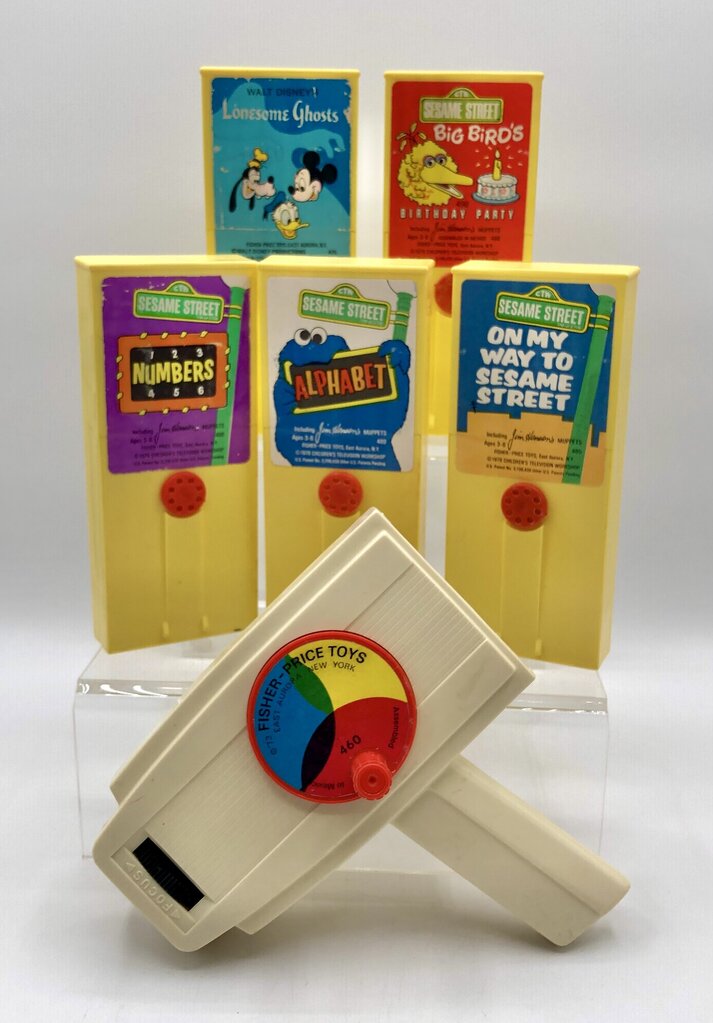 1976 Fisher Price Movie Viewer w/ 5ea 8mm Film Cartridges /b