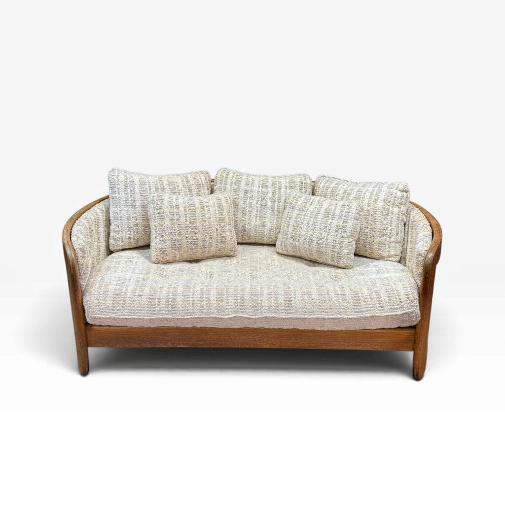 Wood Framed Loveseat With Textured Cream Pillows