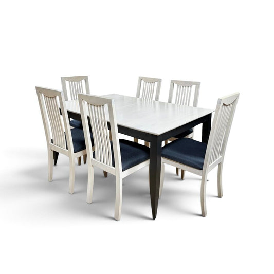 White Maple Dining Table With 2 Leaf Extensions and 6 Black Upholstered Chairs