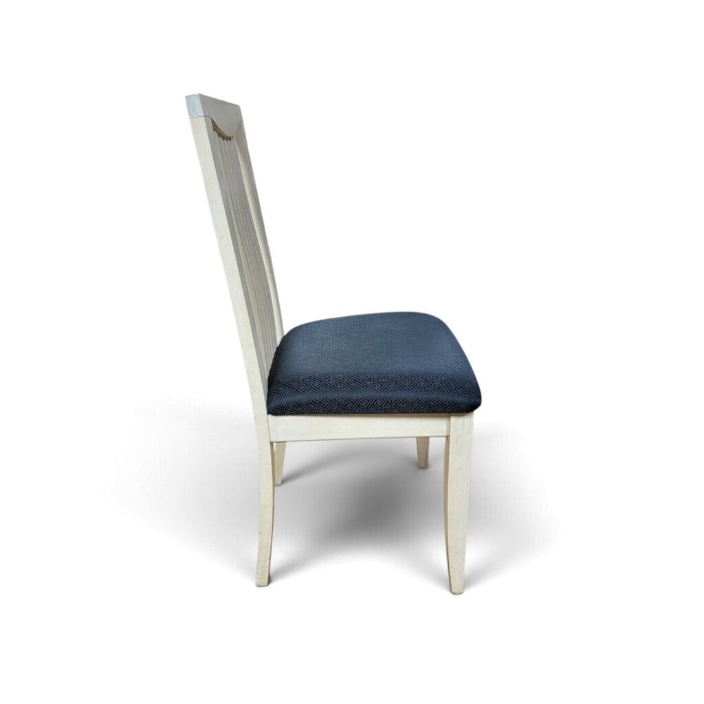 White Maple Dining Table With 2 Leaf Extensions and 6 Black Upholstered Chairs