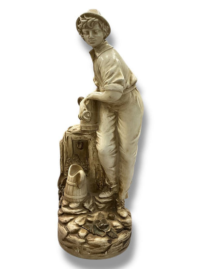Boy getting water statue AS IS