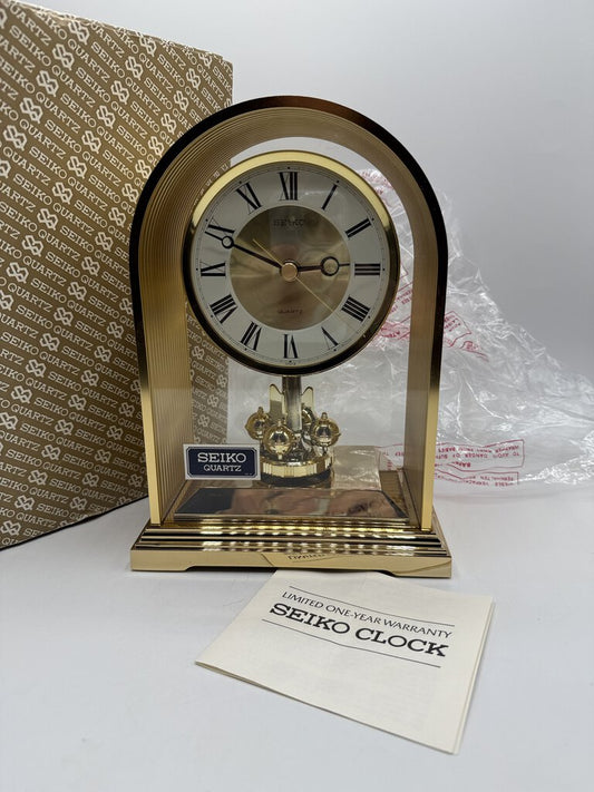 Seiko Rotating Pendulum Quartz Clock Model QQW535G NIB /rw