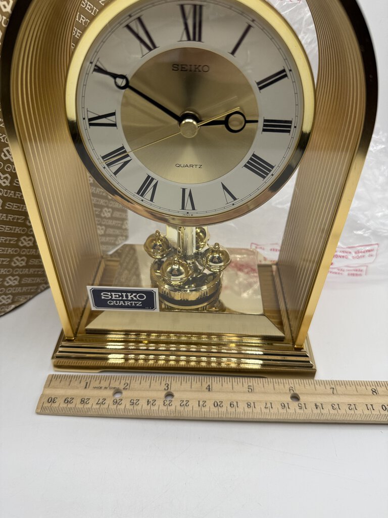 Seiko Rotating Pendulum Quartz Clock Model QQW535G NIB /rw