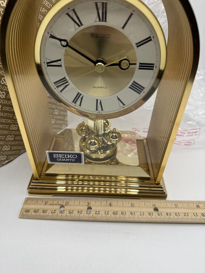 Seiko Rotating Pendulum Quartz Clock Model QQW535G NIB /rw