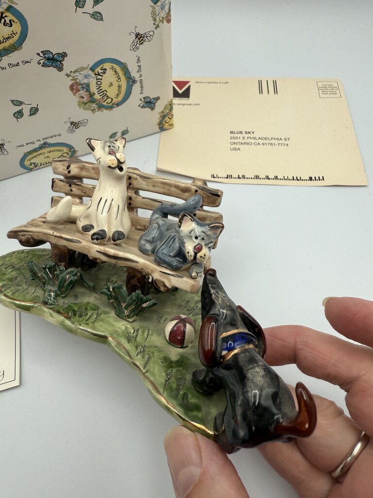 Clay works by Heather Goldminc Sculpture “Cathy’s on Park Bench Meeting Dog /ro