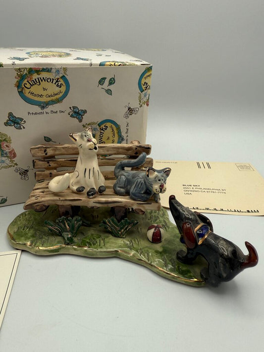 Clay works by Heather Goldminc Sculpture “Cathy’s on Park Bench Meeting Dog /ro