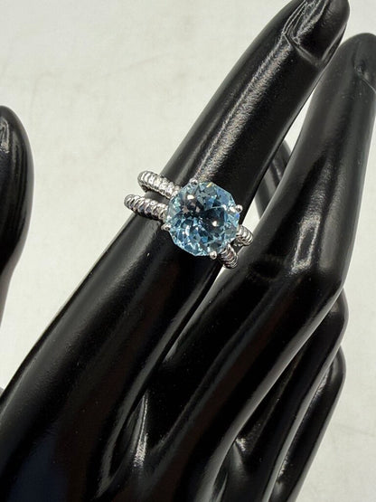 Blue Topaz Solitaire in Sterling Silver setting size 6 /ro
